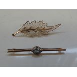 9ct gold pin brooch with centre blue stone togethe