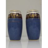A pair of Royal Doulton vases blue, white with gil
