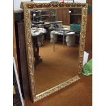 Large gilt framed bevel edged mirror