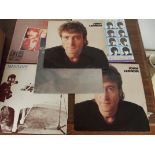 Five Beatles and John Lennon vinyl albums