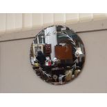 Circular wall mirror, etched and bevelled with pie