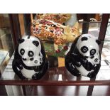 Pair of Wade panda money boxes together with a cer