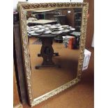 Large gilt framed bevel edged mirror