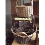 Two wicker baskets together with a stool