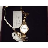 Tissot lady's cocktail watch with 9 carat gold cas