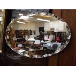 Frameless bevelled mirror with pie crust edge