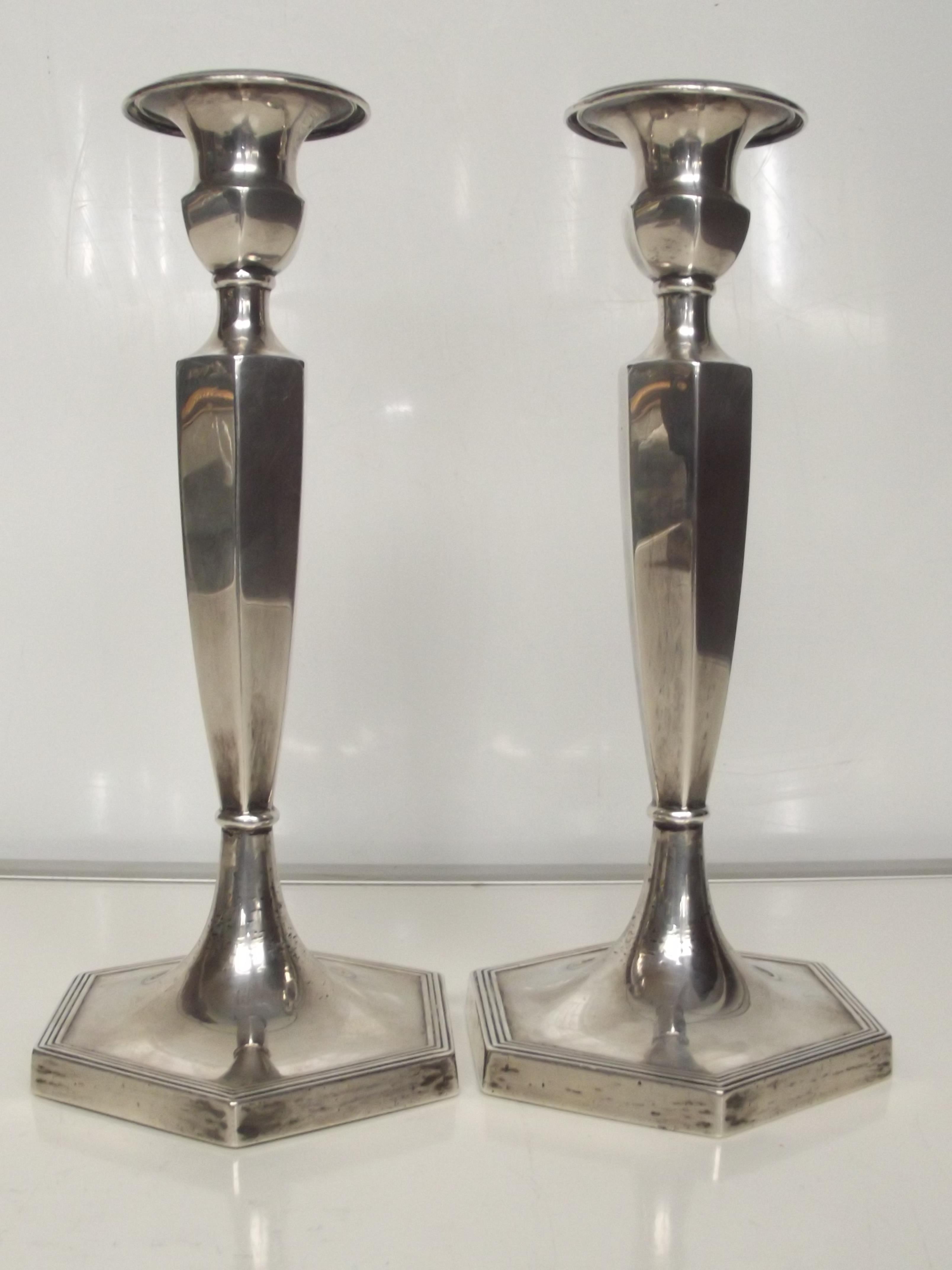 Pair of silver candlesticks with detachable sconce