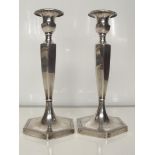 Pair of silver candlesticks with detachable sconce