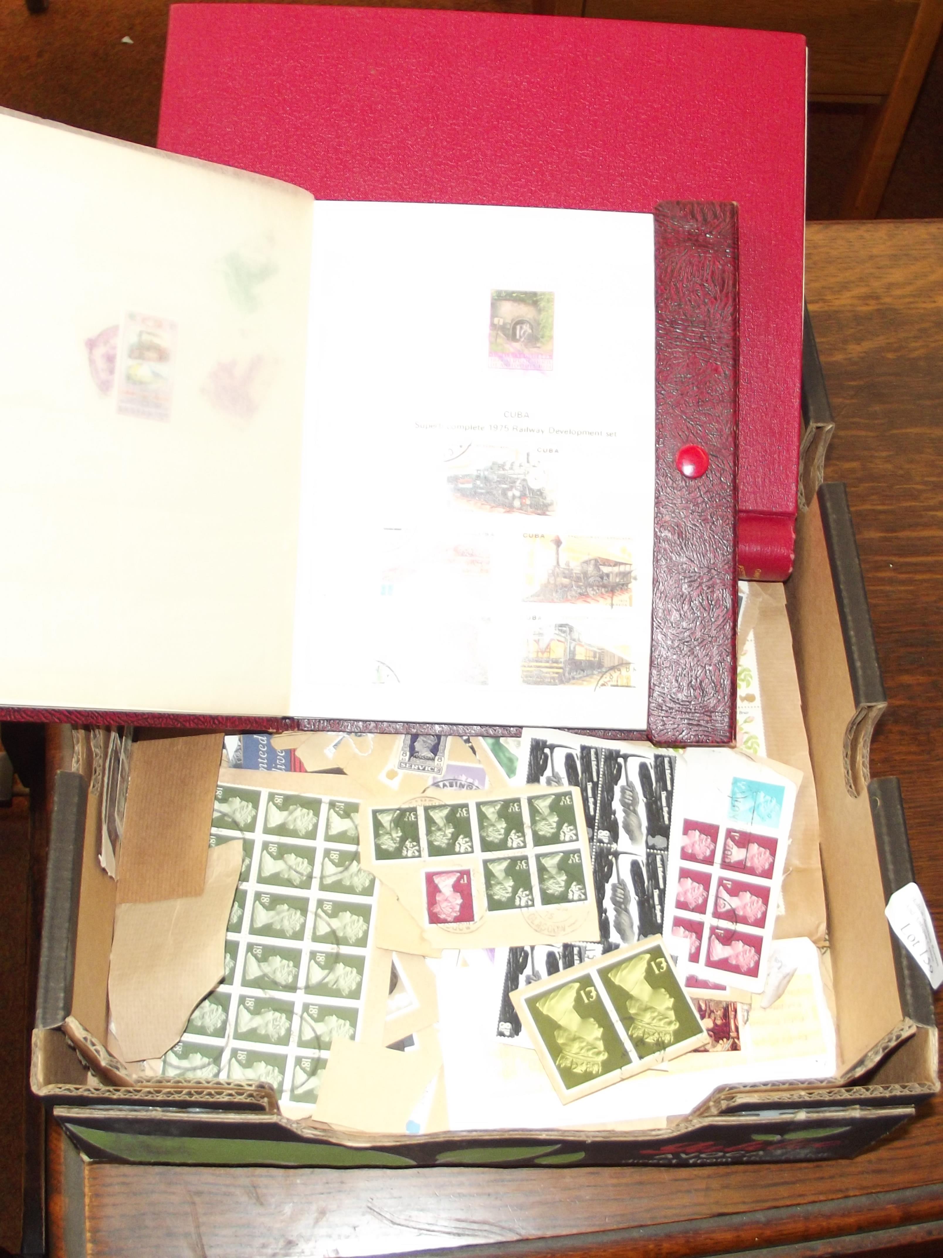 2 stamp albums and loose stamps