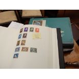 Three stamp albums