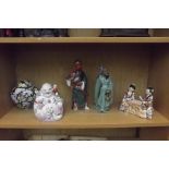 Shelf of oriental figures