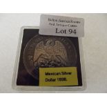 A Mexican silver dollar 1898