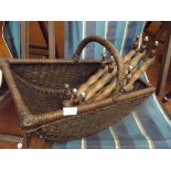 Vintage basket together with a pegged coat hanger