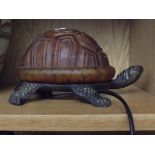 Glass and metal tortoise lamp