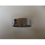 Broad silver hinged bangle