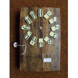 Dominos clock mounted on oak