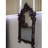 Victorian mahogany rococo style mirror in mahogany, the frame faded to a good colour, 132cm x 75cm