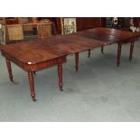 19th century extending table in mahogany on turned legs, 291cm x 129cm x 72cm fully extended with
