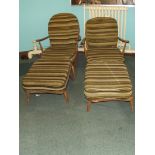 Pair of of stick back Ercol Windsor open armchairs
