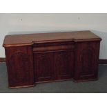 Victorian inverted breakfront mahogany sideboard, freize drawer above a double cabinet flanked by