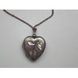 Silver heart shaped pendent and chain