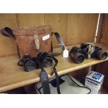 Pair of early cased field glasses together with a