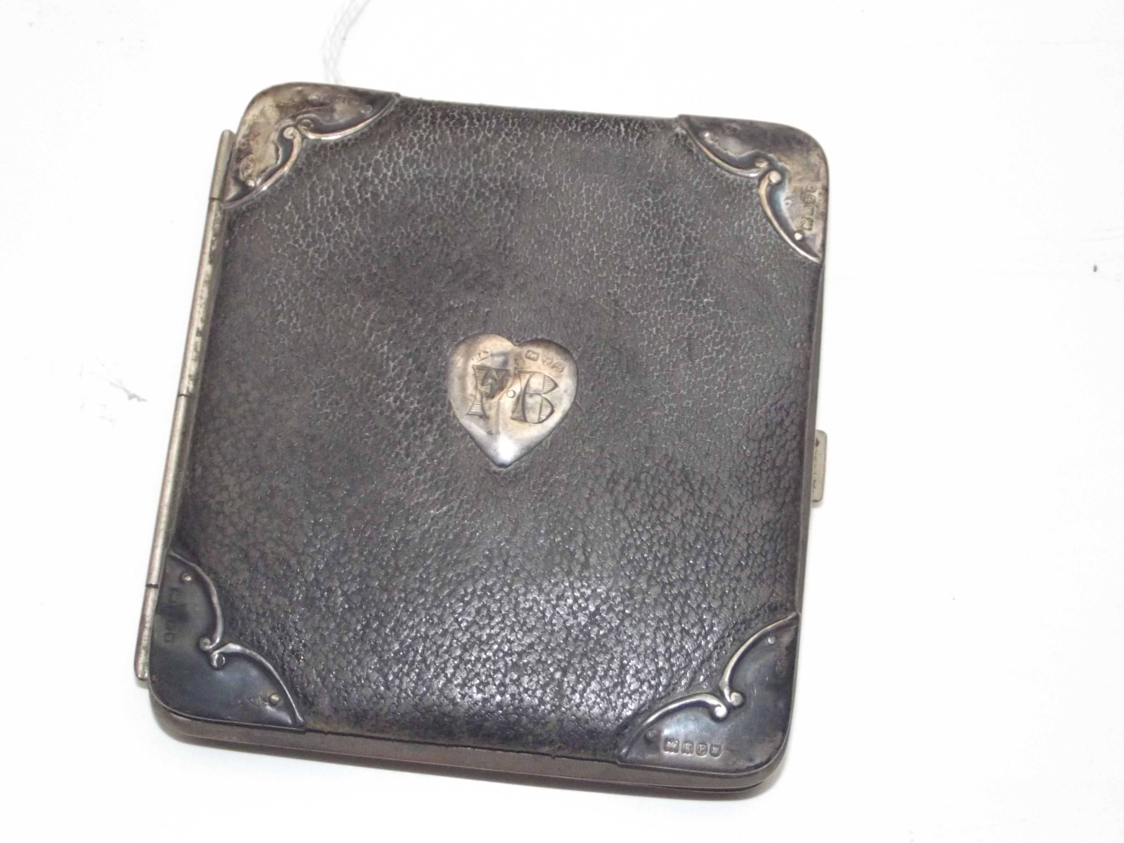 Very old leather and silver wallet