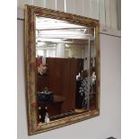 Framed mirror with etched decoration