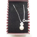 Silver necklace with a pearl pendant