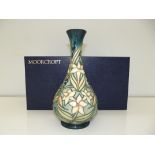 Moorcroft footed bottle vase, Jasmine Carousel pat