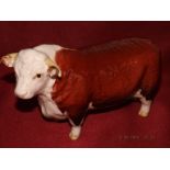 A Beswick Hereford Bull, Ch. of Champions 12cm hig
