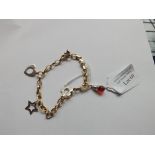 14 ct gold charm bracelet with 5 charms, 9.2 grams