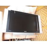 Philips flat screen television together with two D