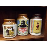 Three stoneware advertising jars