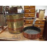 Copper and brass coal bucket together with a rivet