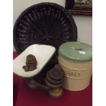 Vintage cake tin, a pair of balance scales togethe