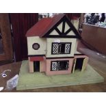 Vintage dolls house with furnishings
