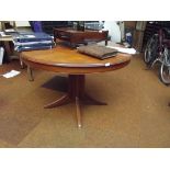 Stag circular top extending dining table and six c