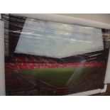 Large glass wall art depicting Old Trafford