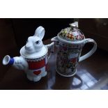 Alice in Wonderland lidded jug by Paul Cardew toge