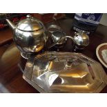 Modernist three piece tea service together with a