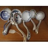 Collection of seven ceramic ladles