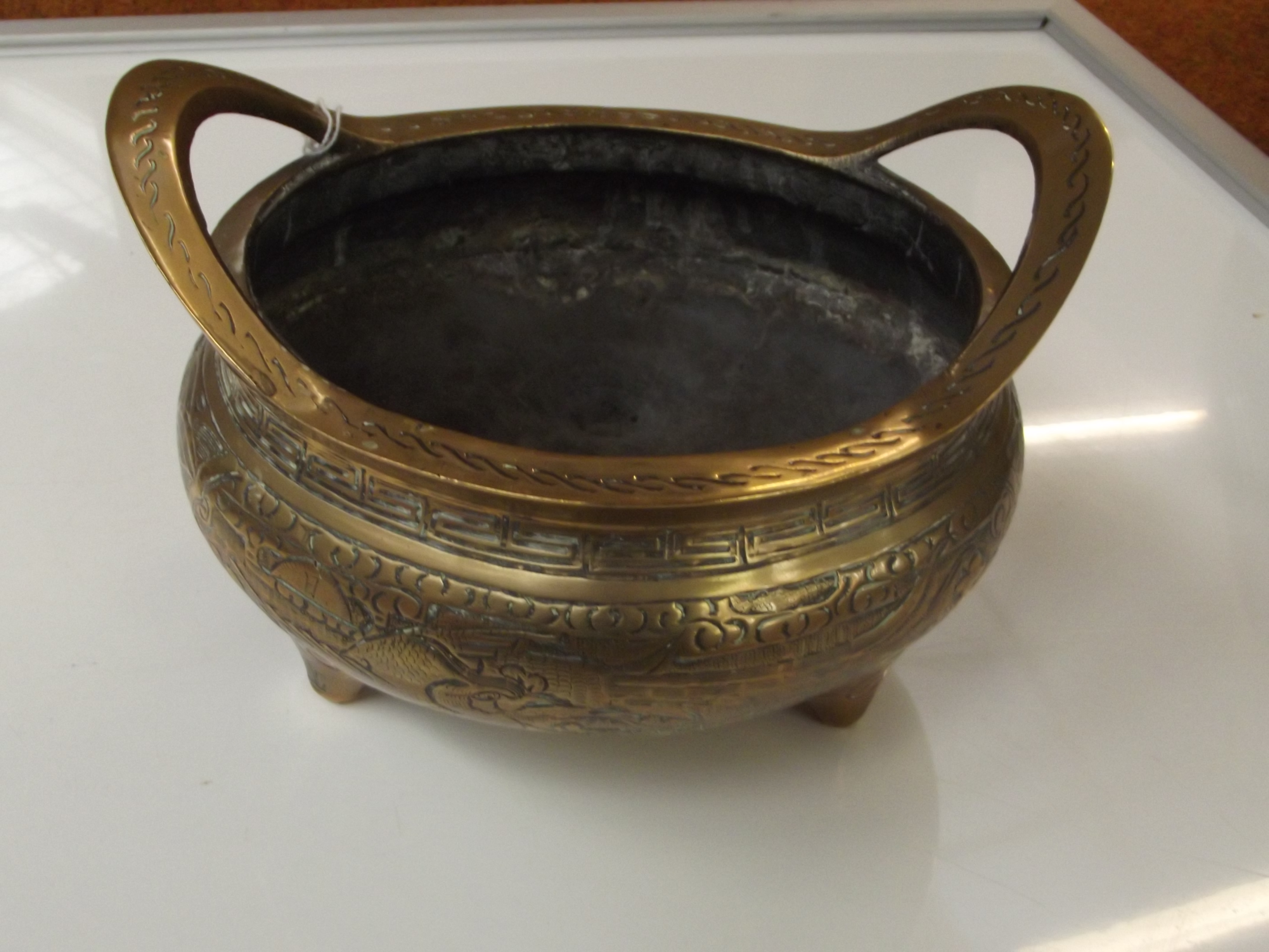 Heavy brass Chinese bowl
