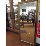 Large gilt framed bevel edge mirror