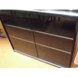 Sliding doors storage unit