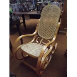 Bentwood rocking chair with cane back and seat