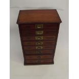 Victorian mahogany collectors cabinet, eight drawers each numbered and with brass military type