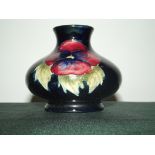 Moorcroft squat vase in the Anemone pattern, impressed and painted marks, height 7cm