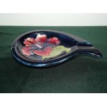 Moorcroft ashtray in the Hibiscus pattern, length 15cm