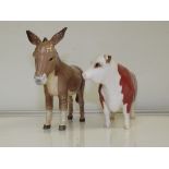 A Beswick Hereford cow, Ch. of Champions 12cm high